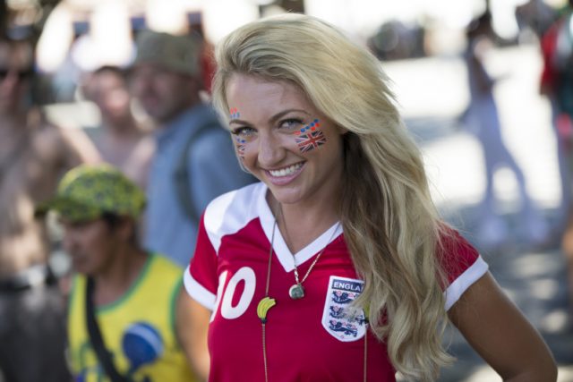 MANAUS, BRAZIL - JUNE 14: England fan Sarah Jayne Hart relaxes in Praca Sao Sebastiao, in front of the Teatro Amazonas opera house, ahead of England's opening game in the FIFA World Cup on June 14, 2014 in Manaus, Brazil. Group D teams, England and Italy, will play their opening match of the 2014 FIFA World Cup when they meet in Manaus this evening. (Photo by Oli Scarff/Getty Images)