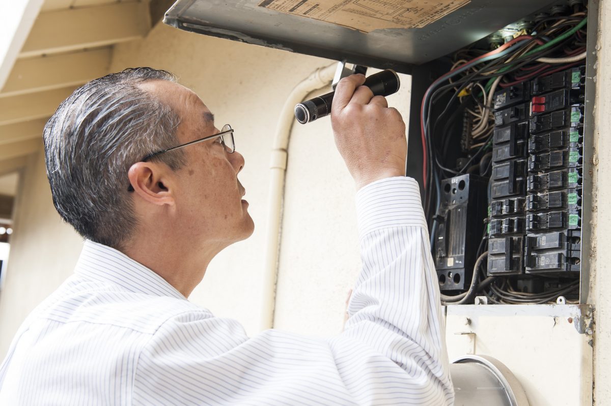 inspecting-electrical-wires-1200x799